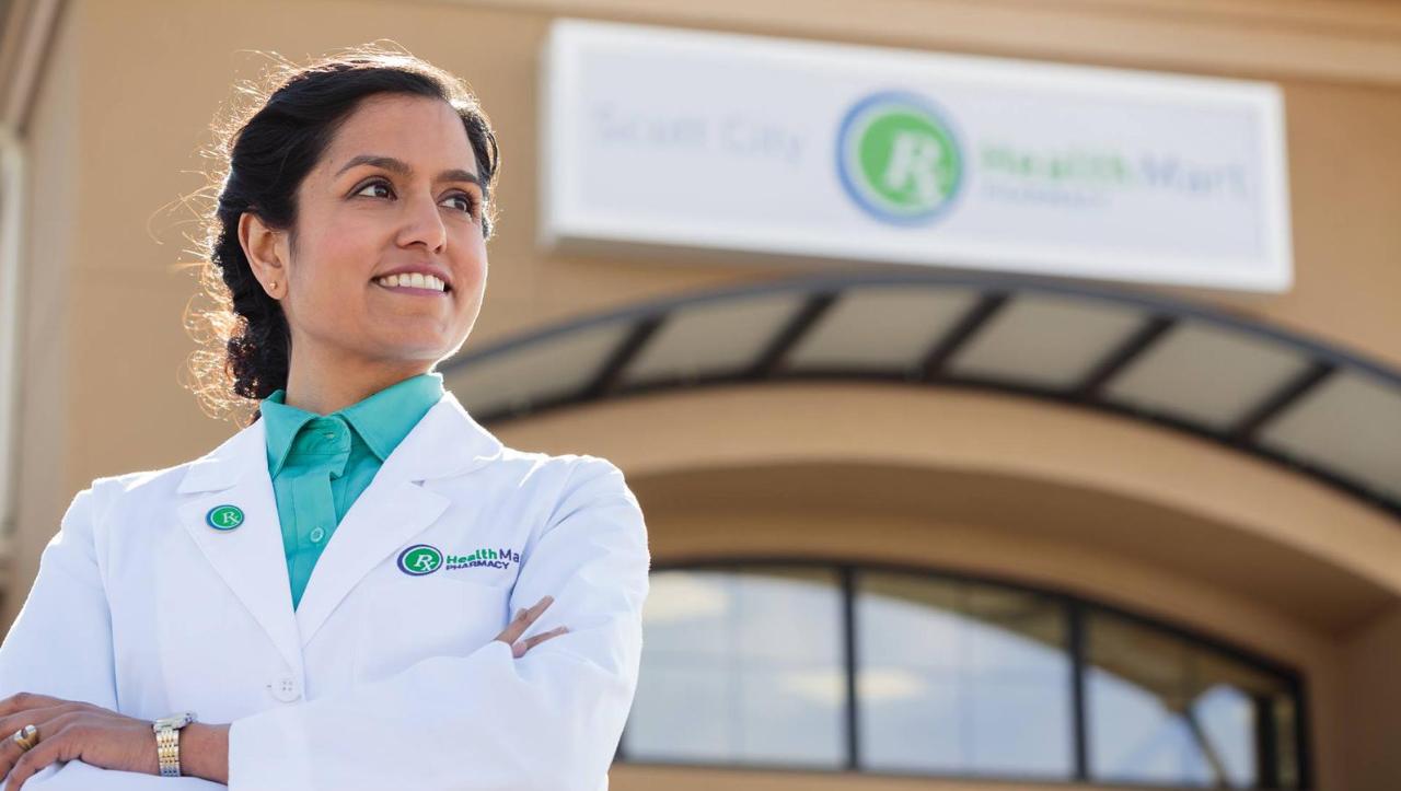 Pharmacy staff smiling
